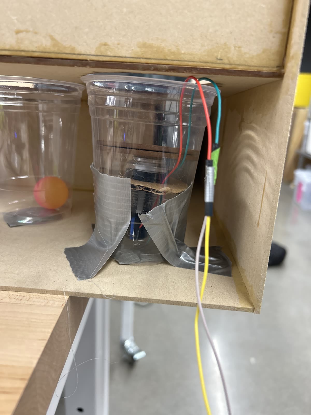 Cup push-button mechanism